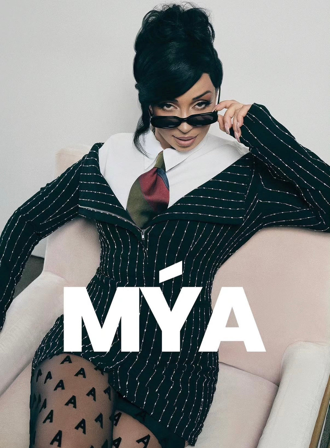 Pinstripes & Power: Mýa’s Muehleder Moment